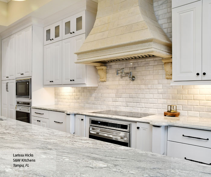 Close up of white cabinets in a traditional kitchen